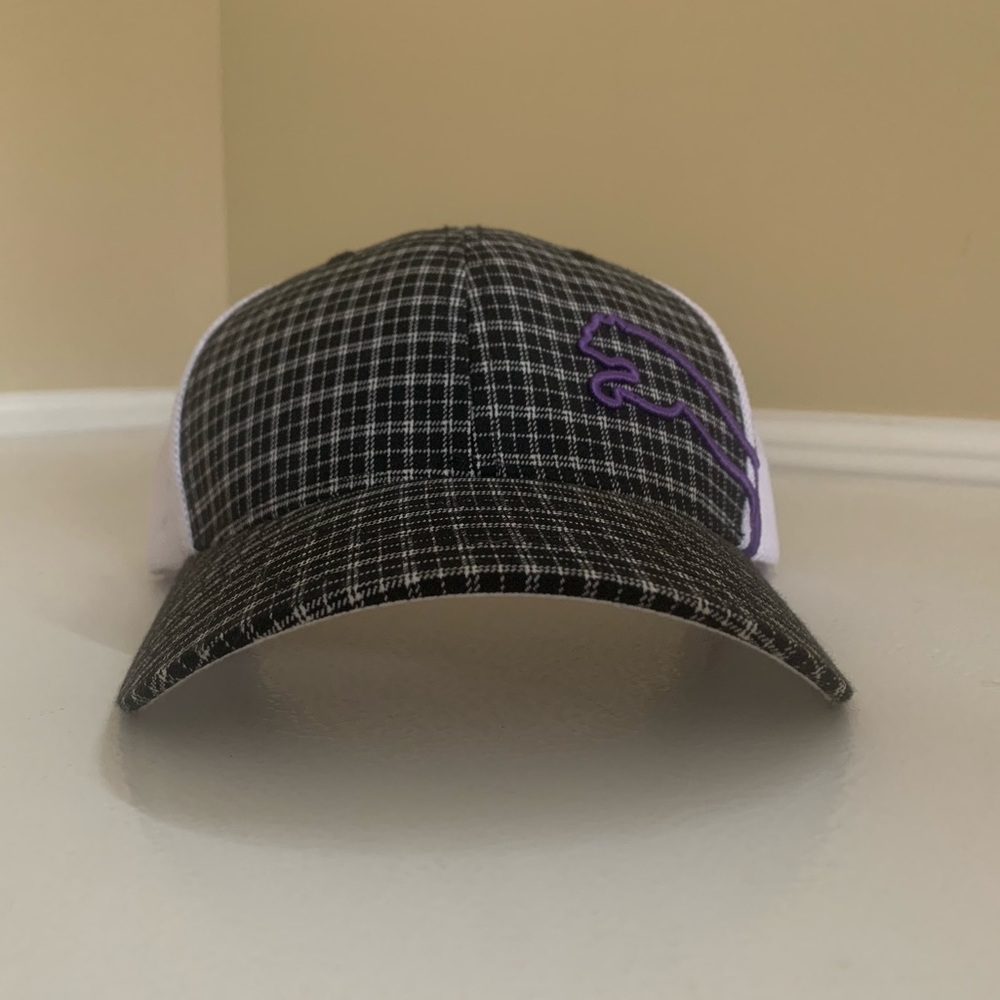 White and Black check puma hat.  Purple logo.